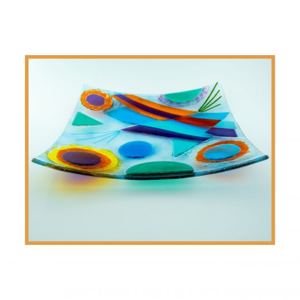 Brighly coloured dish with abstract design