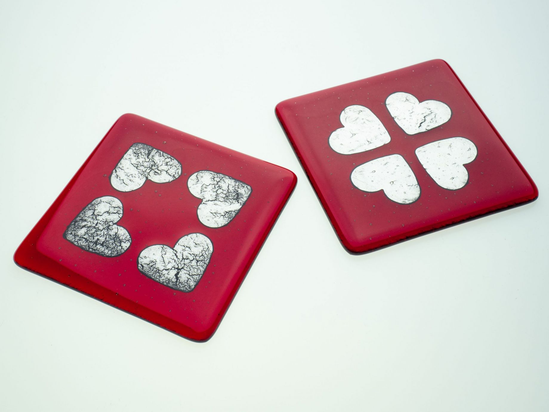 Red coaster with silver hearts